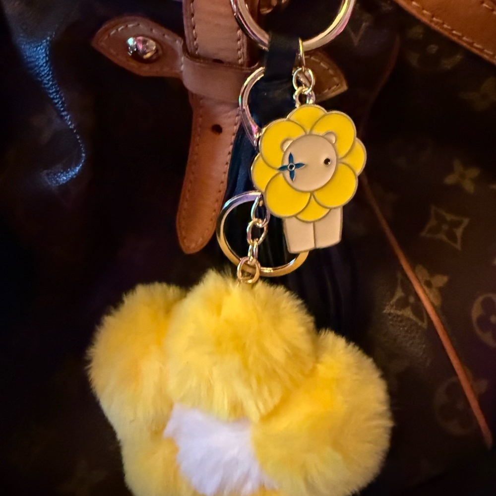 Adorable Louis Vuitton Lion charm, upcycled into bag charm w/Pom Pom and tassle